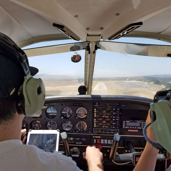 Mike landing his Piper Cherokee at the Santa Ynez on Airport Day